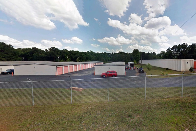 Secure perimeter fencing around the warehouse and storage property at Ryder Mini Storage